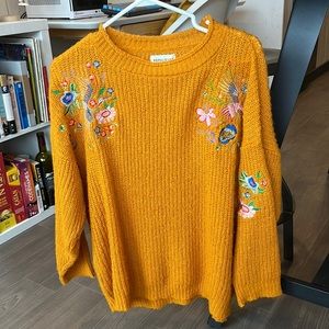 Orange knit sweater